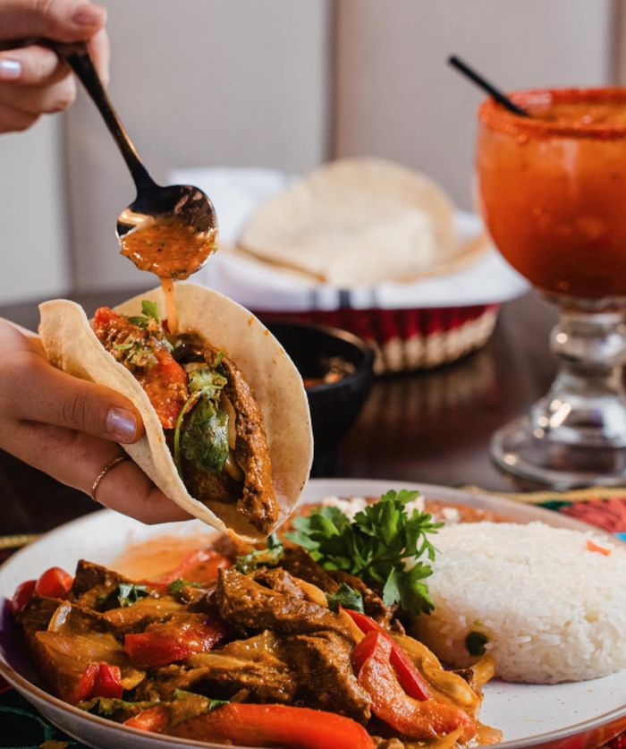Birria taco with consommé